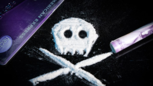 'Snow' as a slang for cocaine, represented by an image of a white cocaine powder forming a skull.